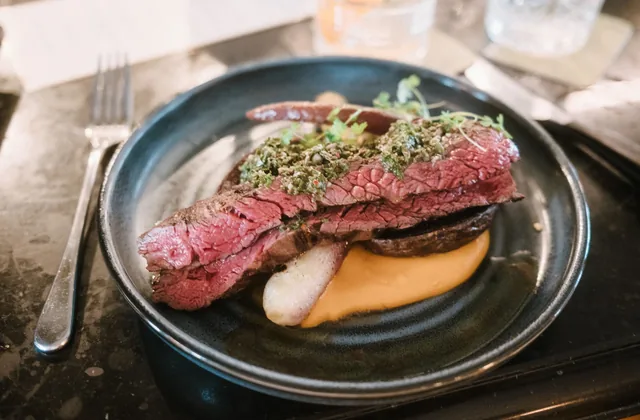Plated dish in warm restaurant light